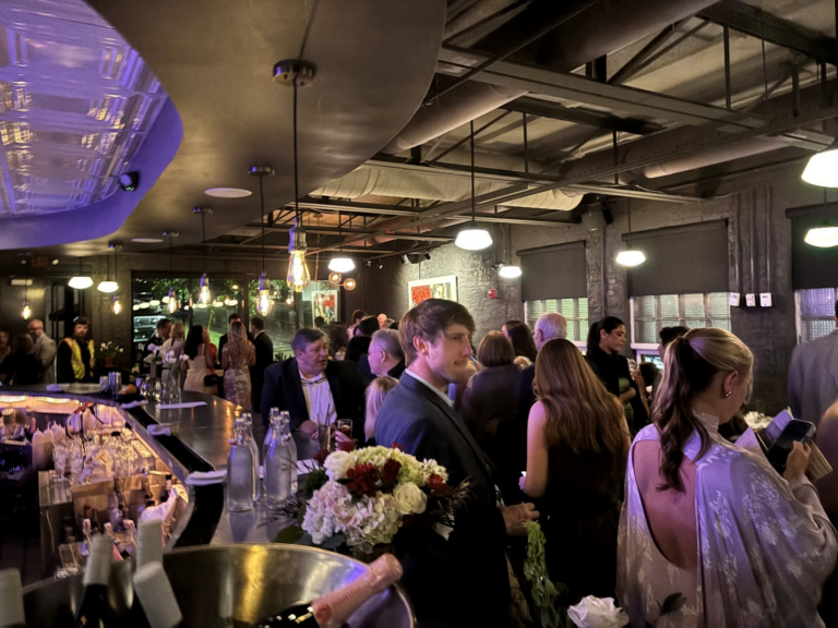 Guests enjoying cocktails and social dining inside Blueprint on 3rd, an upscale casual restaurant in Birmingham, AL