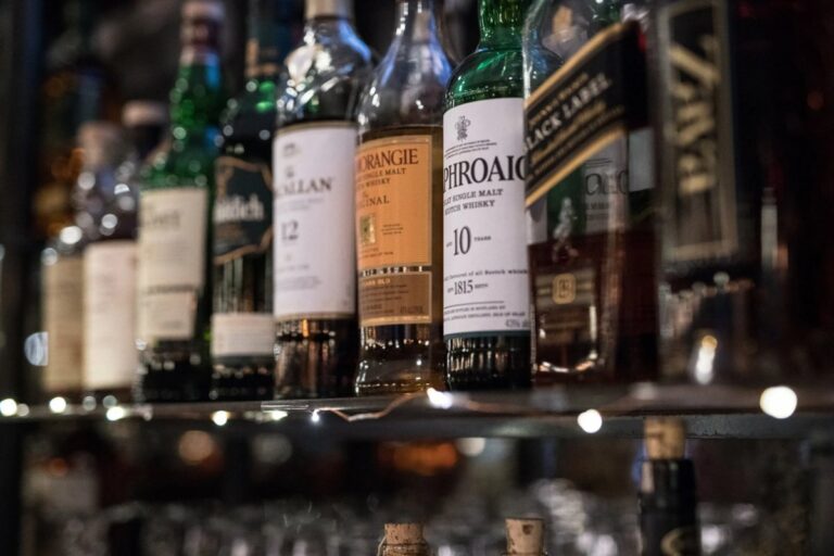 Premium whiskey and spirit bottles displayed on the bar at Blueprint on 3rd in Birmingham